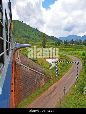 Indian Railways train Kirandul Passenger running through Araku Valley, Andhra Pradesh, India Stock Photo