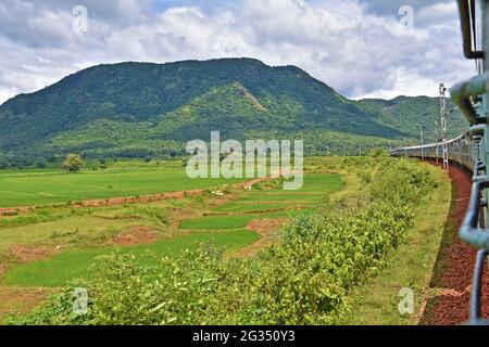 Indian Railways train Kirandul Passenger running through Araku Valley, Andhra Pradesh, India Stock Photo