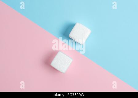 Comparison of Two Objects Blocks Pencils Sticker Notes Facing Inward Outward Making An Arrangement Reflection On a Separated Coloured Background Shot Stock Photo