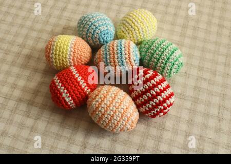 Knitted Easter eggs. Homemade eggs. Stock Photo