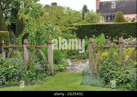 WOLLERTON, SHROPSHIRE / UNITED KINGDOM - 22 MAY 2014: The garden at Wollerton Old Hall Stock Photo