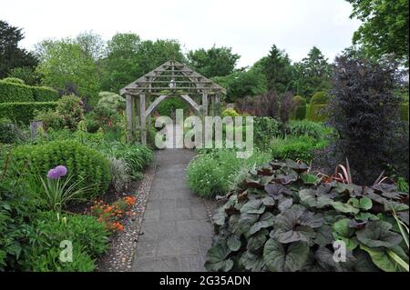 WOLLERTON, SHROPSHIRE / UNITED KINGDOM - 22 MAY 2014: The garden at Wollerton Old Hall Stock Photo