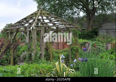 WOLLERTON, SHROPSHIRE / UNITED KINGDOM - 22 MAY 2014: The garden at Wollerton Old Hall Stock Photo