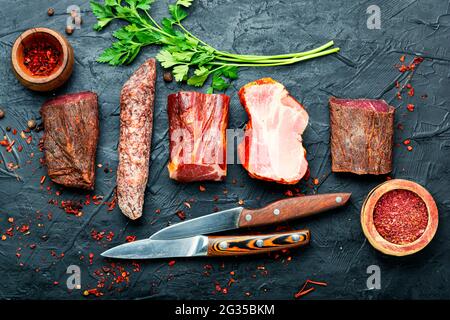 Italian meat platter.Cured meat and sausages.Long banner Stock Photo