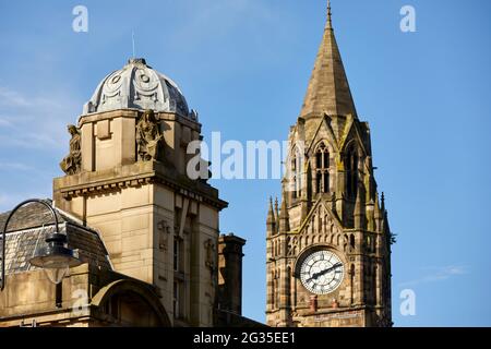 Grade I listed Manchester, Rochdale town hall clocktower and the dome of Grade II former Union Bank and now the MANNERIST bar Stock Photo