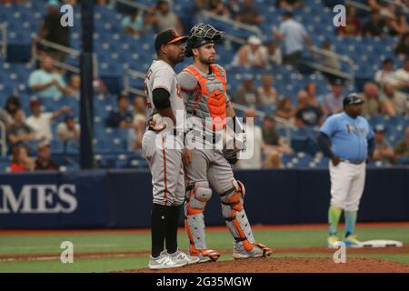 St. Petersburg, FL. USA  Baltimore Orioles relief pitcher Cesar Valdez (62) and catcher Austin Wynns (61) await the results of the challenge of the gr Stock Photo