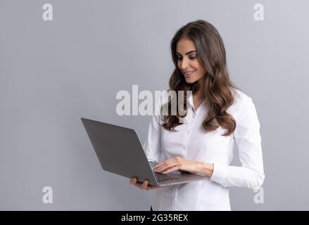 E-learning even from far away. Happy girl student use laptop. E-learning. Distance education Stock Photo