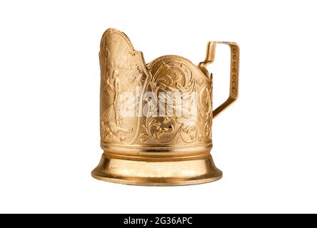 Cup holder isolated on a white background. Old gold-colored metal cup holder. Stock Photo