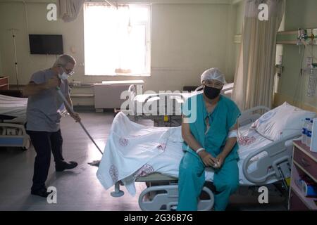 Izmir, Izmir, Turkey. 14th June, 2021. Mustafa Oz is a lung cancer patient. He protected himself from Covid virus till he got vaccinated. In the image he is getting ready to go into surgical operation after being treated in a state hospital in Izmir. Credit: Uygar Ozel/ZUMA Wire/Alamy Live News Stock Photo