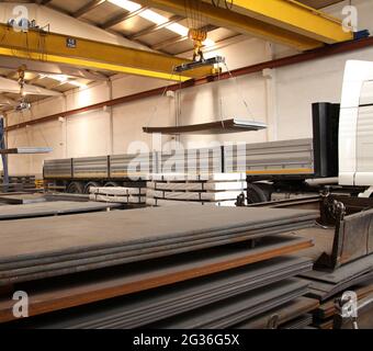 New metal sheets. Loading goods on the truck. Stock Photo