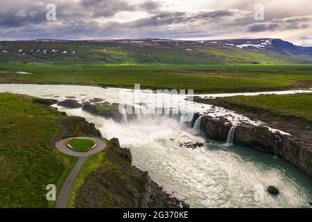 Aerial view of the Godafoss waterfall in Iceland with viewing area for tourists Stock Photo