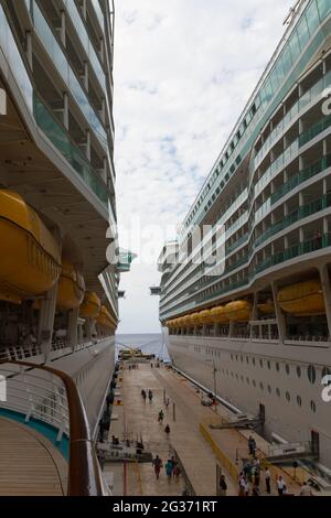 Cozumel, Mexico - May 02, 2015: Two Royal Caribbean Cruise Line ships docked in the port of Cozumel, Mexico Stock Photo