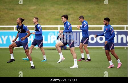England’s Dominic Calvert-Lewin, Harry Maguire and Reece James (left-right) during the training session at St George's Park, Burton upon Trent. Picture date: Monday June 14, 2021. Stock Photo