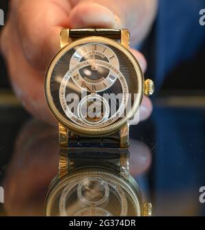 Bonhams, London, UK. 14 June 2021. Bonhams Fine Watches sale will take  place on 16 June. Image: Louis Vuitton. An 18K white gold, diamond and  emerald set automatic calendar chronograph wristwatch Tambour