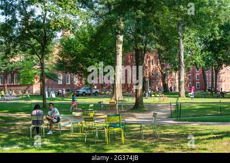 Students and visitors in the Old Yard of Harvard Yard, Harvard University, Cambridge, Boston, Massachusetts, USA Stock Photo