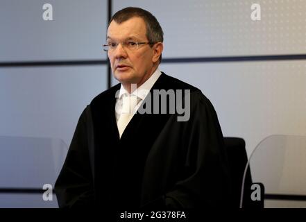 Wuppertal, Germany. 14th June, 2021. Presiding Judge Jochen Kötter stands in the courtroom. In the case of the five children killed in Solingen, North Rhine-Westphalia, the murder trial against their mother has begun at the Wuppertal Regional Court. Credit: Oliver Berg/dpa/Alamy Live News Stock Photo