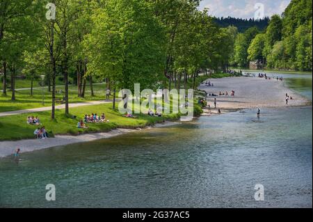 Isar bank with people, Bad Toelz, Upper Bavaria, Bavaria, Germany Stock Photo
