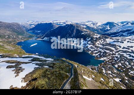 Aerial of a mountain lake in the mountains over Geirangerfjord, Sunmore, Norway Stock Photo