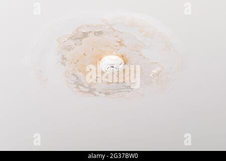 Damp on a wall causing damage and peeling paint Stock Photo