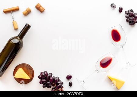 Set of wine bottle with glasses corkscrew and grape Stock Photo