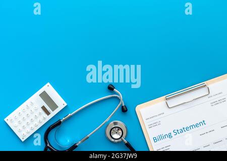 Stethoscope with medical billing statement. Top view Stock Photo