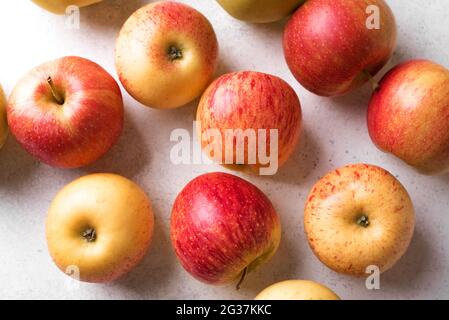 Apples on white background, close up. Garden organic red and yellow apples. Stock Photo