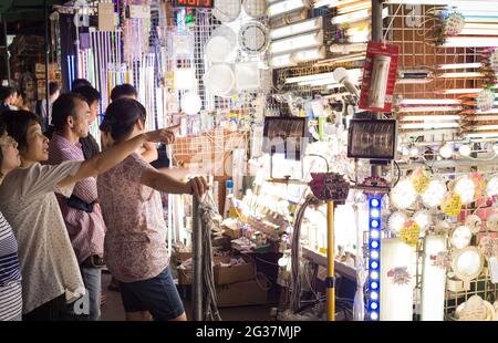 LED and other lighting for sale in Sham Shui Po night market, Kowloon, Hong Kong Stock Photo