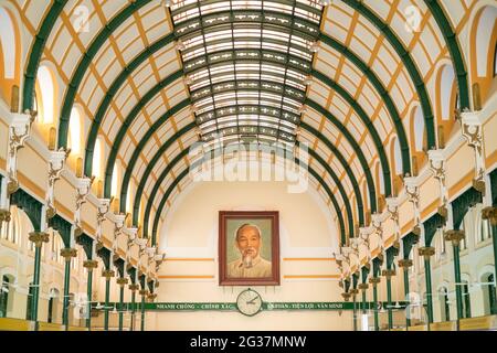 Ho Chi Minh, Vietnam - March 30, 2016: Saigon Central Post Office interior architecture with vietnamese leader portrait Stock Photo