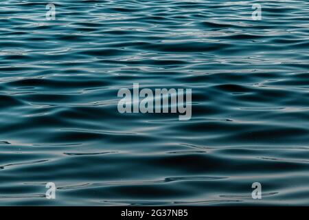 defocused blue water surface background Stock Photo
