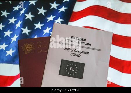 Poland. 14th June, 2021. In this photo illustration the EU Digital COVID certificate is pictured with the United States of America flag in the background. (Photo by Omar Marques/SOPA Images/Sipa USA) Credit: Sipa USA/Alamy Live News Stock Photo
