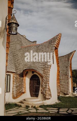 Vertical shot of the Castelul de Lut Valea Zanelor landmark in Porumbacu de Sus, Romaniaa Stock Photo