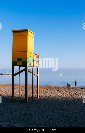 lifeguard watch tower. Benalmádena Costa, beach at sunset on a late February, 2021. Benalmádena, Málaga, Costa del Sol, Andalucía, Spain, Europe Stock Photo