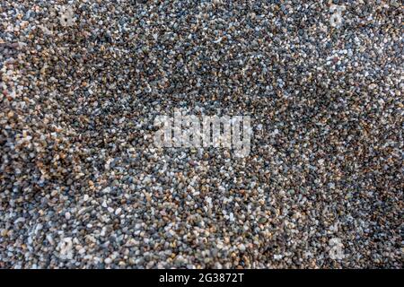 Close up view of rough sand on the beach. Stock Photo