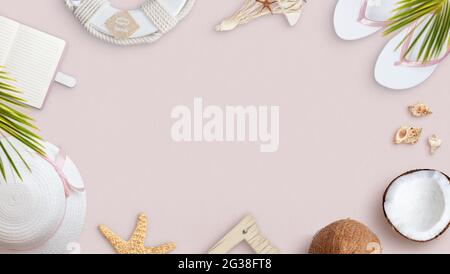 Summer beach background concept. Accessories on pink surface. Top view, flat lay Stock Photo