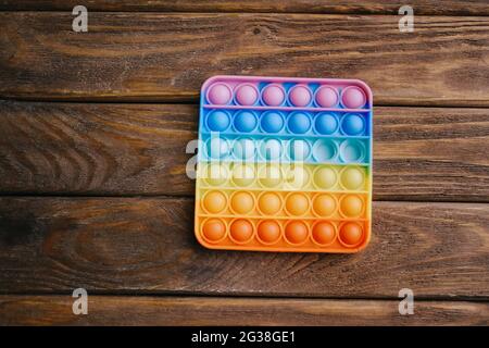 Children's toy 'simple dimple' rainbow coloring. Stock Photo