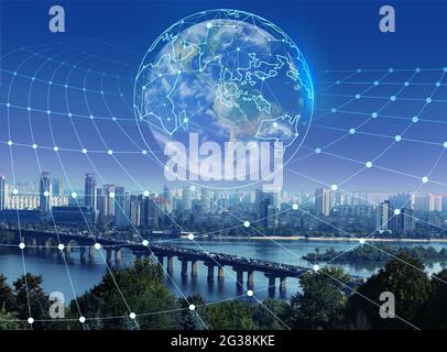 Modern city and digital model of Earth with location pointers. Concept of internet Stock Photo