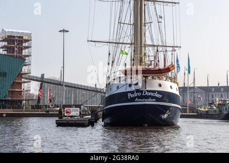 Amsterdam, Netherlands - 12 March 2016: Ships moored in the center of Amsterdam, Oosterdock. Stock Photo