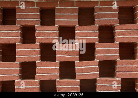 Decorative painted brick walling in urban Qingdao, Shandong province, China Stock Photo