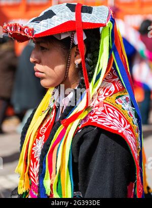 Indigenous Peruvian Quechua woman portrait in traditional clothing during Inti Raymi sun festival, Cusco, Peru. Stock Photo