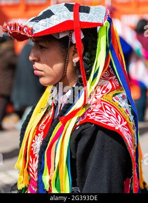 Portrait of young Peruvian indigenous Quechua woman with traditional ...