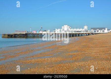 Early morning wide angle image of Portsmouth's South Parade Pier on the seafront at very low tide. Stock Photo