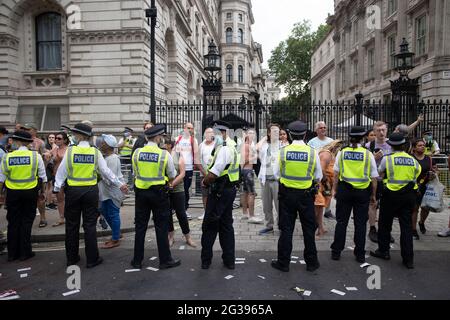 London, UK. 14th June 2021. Met Police clears the road and trys to disperse the protesters. Yuen Ching Ng/Alamy Live News Stock Photo