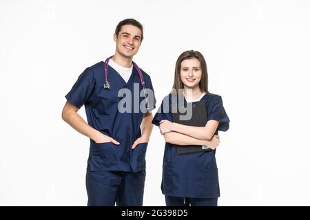 Handsome doc guy professional lady patients consultation virology clinic listen client complaining arms crossed confident doctors wear lab coats isola Stock Photo