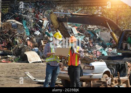 Recycling industry a worker who recycling thing on recycle center Stock Photo