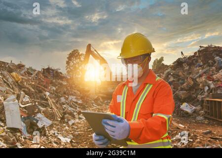 workers in recycling factory,engineers standing in recycling center Stock Photo