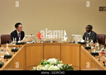 Jeddah, Saudi Arabia. 14th June, 2021. Chen Weiqing (L), Chinese ambassador to Saudi Arabia and the representative of China to the Organization of Islamic Cooperation (OIC), and Mansur Muhtar, vice president of the Islamic Development Bank (IsDB), attend a signing ceremony of an agreement in Jeddah, Saudi Arabia, on June 14, 2021. The Chinese Ministry of Foreign Affairs signed an agreement with the Islamic Development Bank (IsDB) on Monday, offering assistance to the bank members to build anti-epidemic public health laboratories. Credit: Wang Haizhou/Xinhua/Alamy Live News Stock Photo