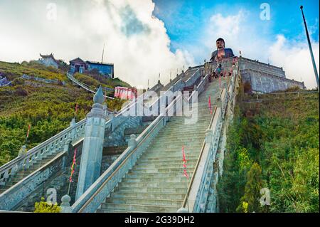 A view of the train and steep steps leading to the large buddah on top of Fansipan mountain, Sapa, in the Lao Cai provice of Vietnam Stock Photo