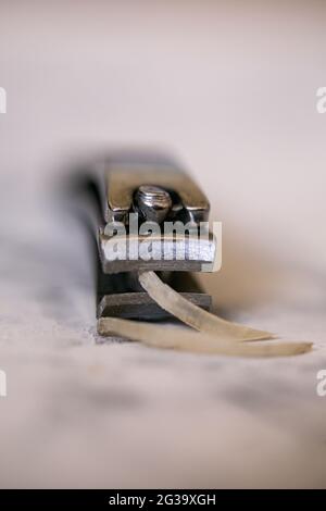 close-up nail clippers with human fingernail. Stock Photo