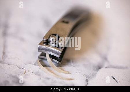 close up nail clippers with human fingernail Stock Photo