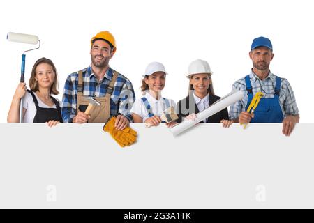Group of industrial workers with blank banner. Isolated over white background. Stock Photo